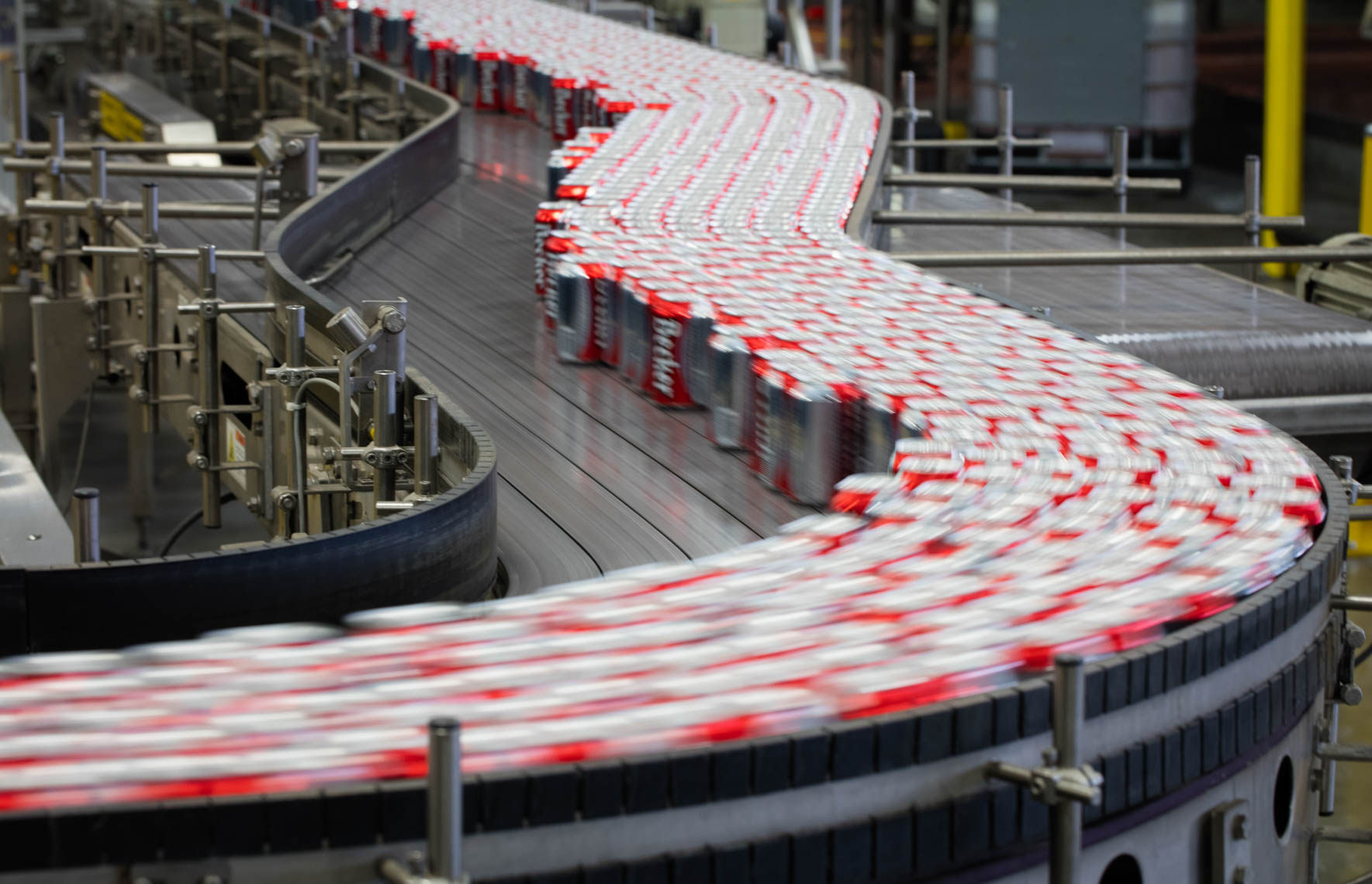 Beer Cans on a Brewery Conveyor Belt