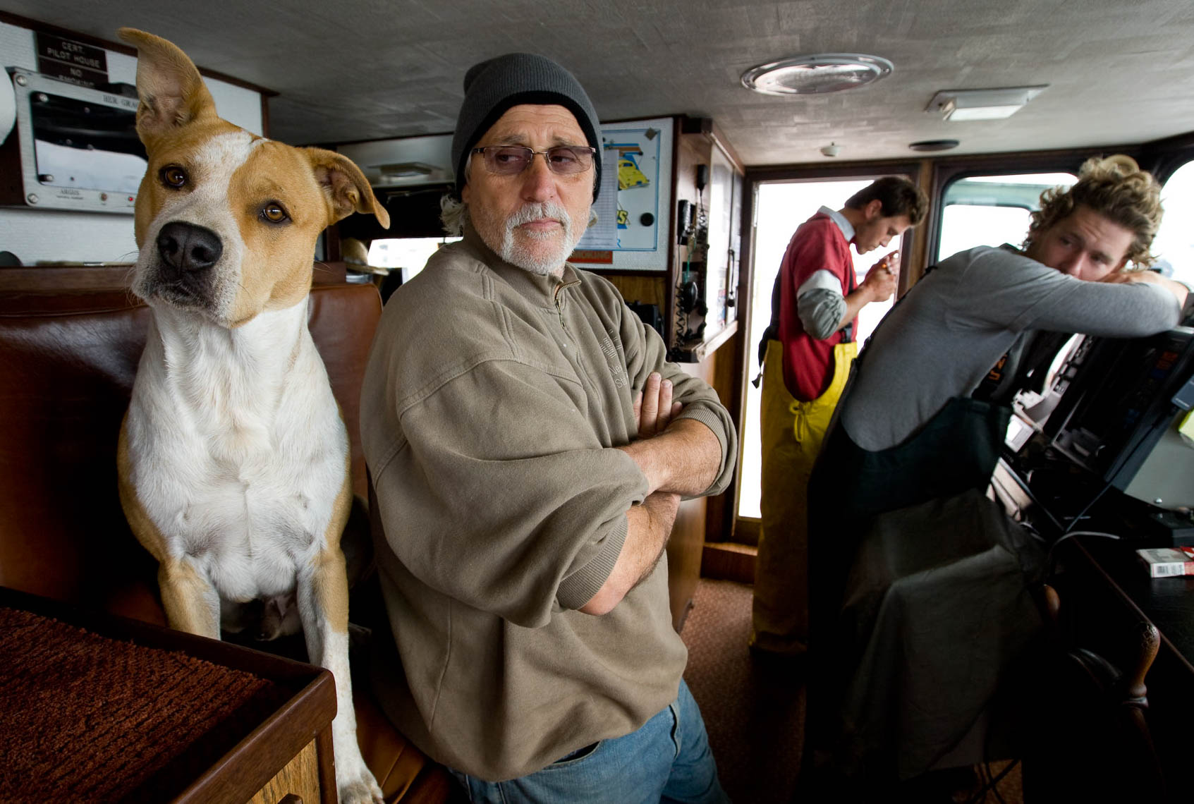 Captain and Dog in the Wheelhouse of Tuna Boat