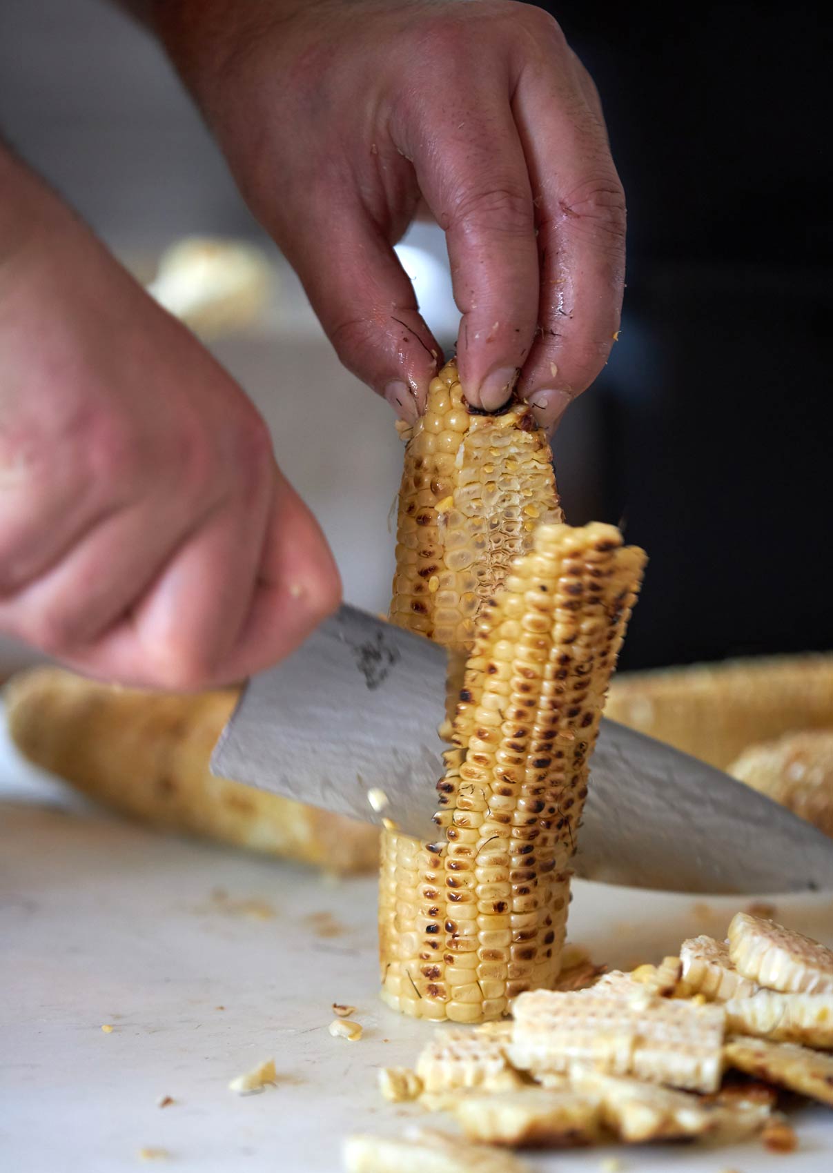 Grilled Corn is Sliced From the Cob. 